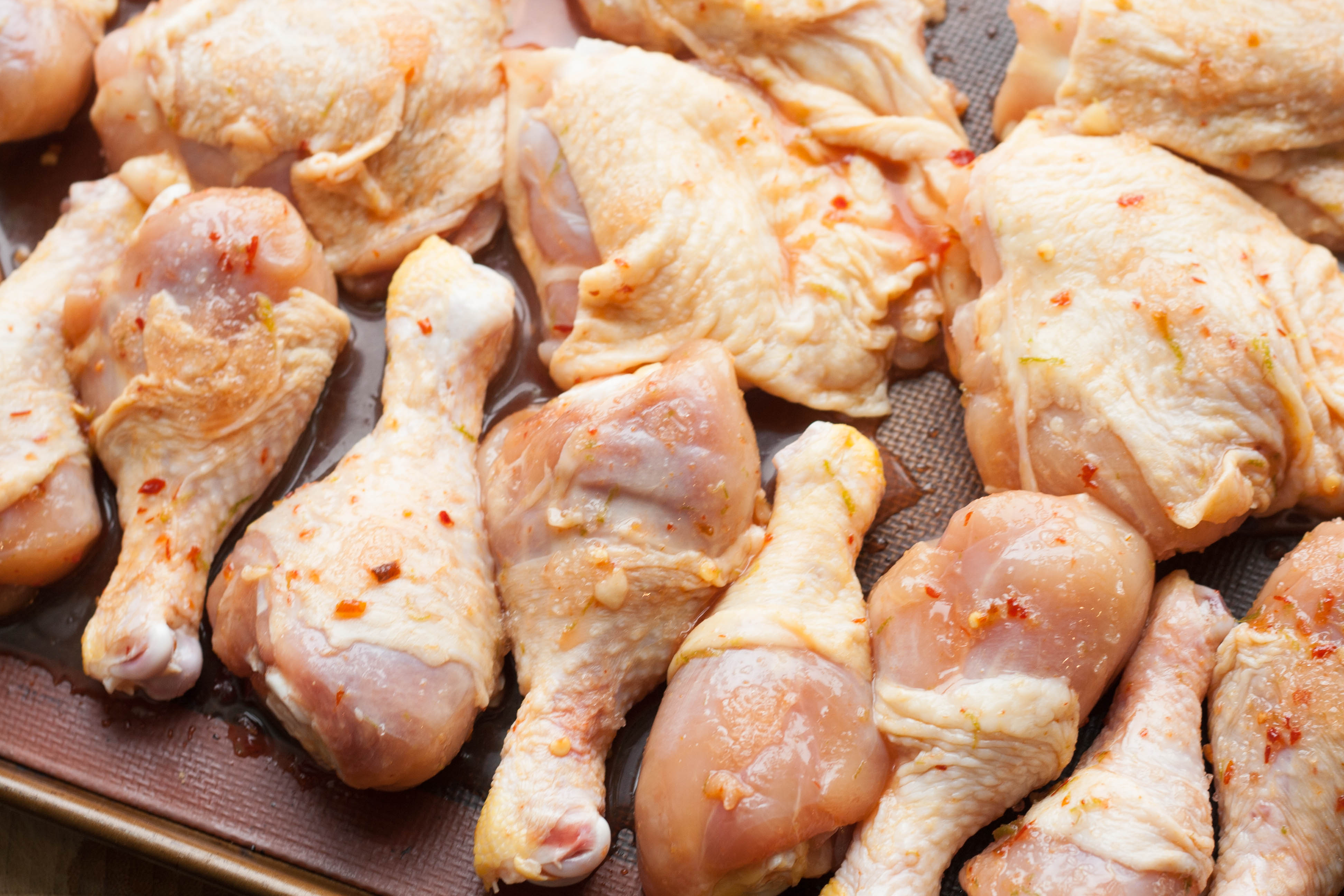 Sweet-Chili-Lime-Chicken-Thighs-and-Drumsticks-on-tray.jpg