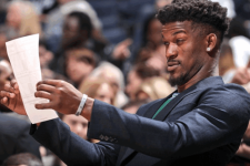 what-am-i-reading-squinting man squinting at paper.png